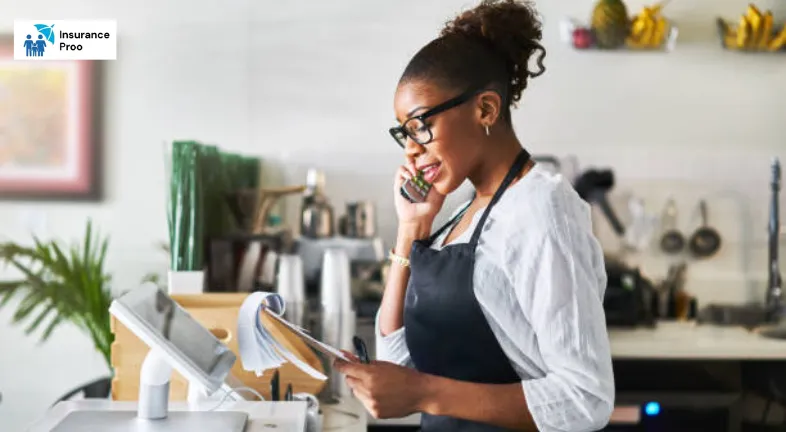 friendly-waitress-taking-order-on-phone-at-restaurant-and-writing-on-notepad
